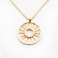  handmade fine jewelry. handmade gold charms. martine jewelry. gold jewelry. one of a kind jewelry. handmade. female owned business resort wear cool charms small gold charm planet charm sunshine charm 14k gold charms pendant charm gold pendant